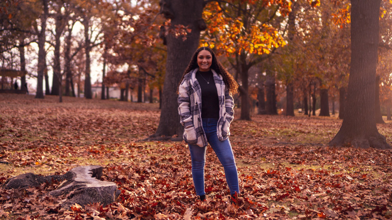 Senior portrait in autumn leaves, natural light photography Tulsa